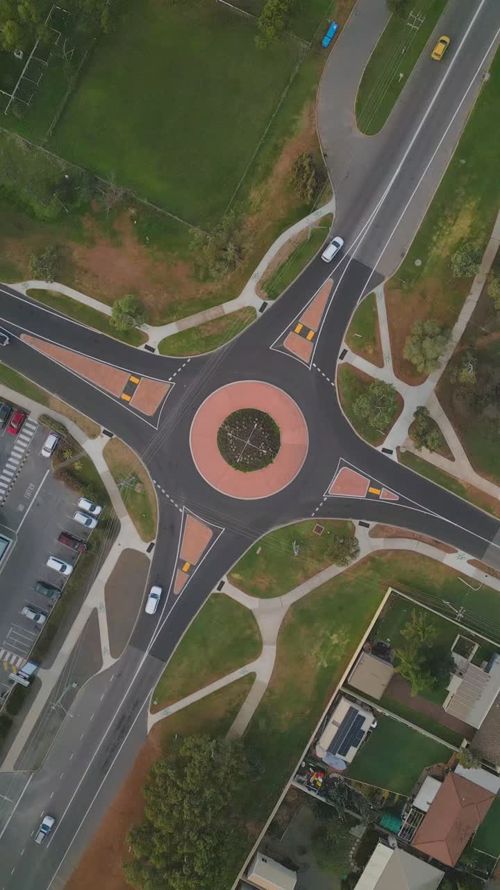 Vertical aerial footage of traffic at a roundabout in Geraldton, Perth, Western Australia