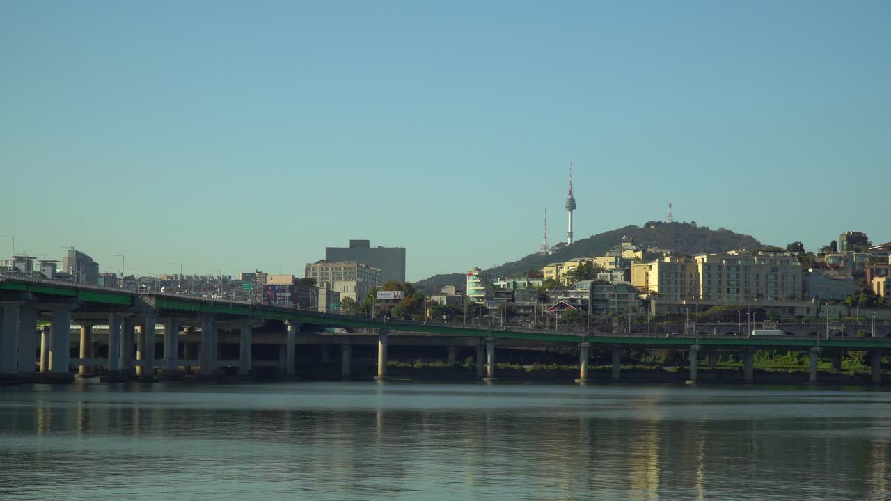 Seoul city at Han river with N Seoul Tower or Namsan Tower over Yongsan-gu district