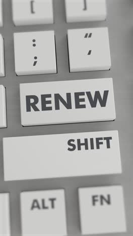 presión del botón de renovación en el teclado vídeo vertical