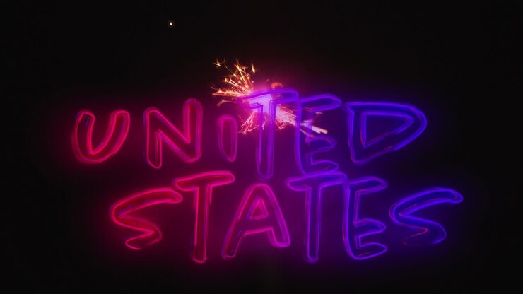 Tekst "United States" og en gnist til fjerde juli