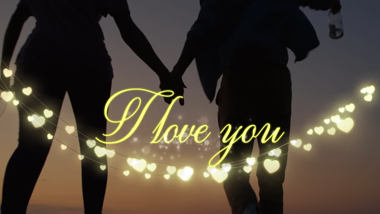 검은색 배경으로 사랑하는 커플과 함께 "i love you"의 애니메이션