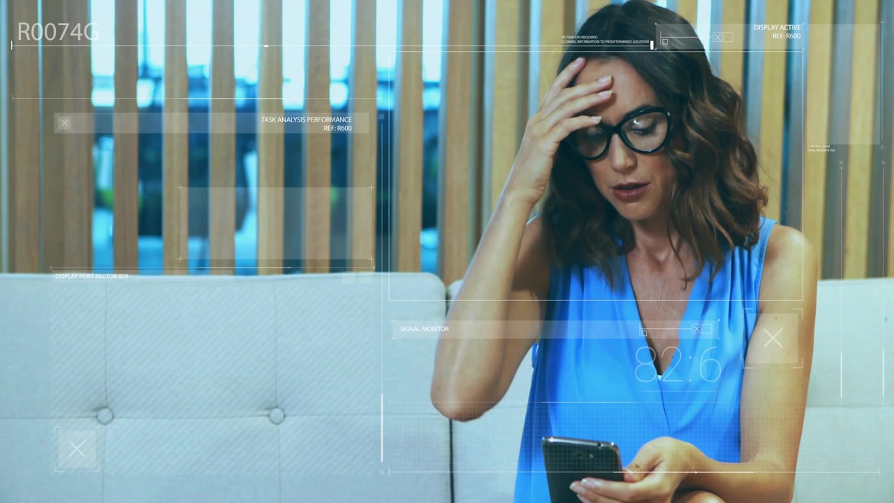 Woman reacting to notification popping up, scrolling smartphone while adjusting glasses to read