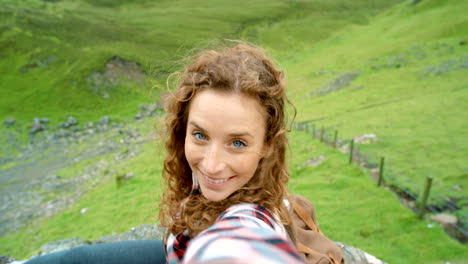 woman hiking in scenic mountains