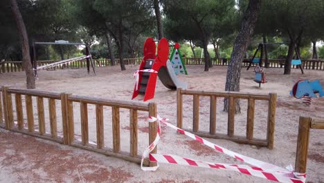 a closed children´s playground motivated for covid-19