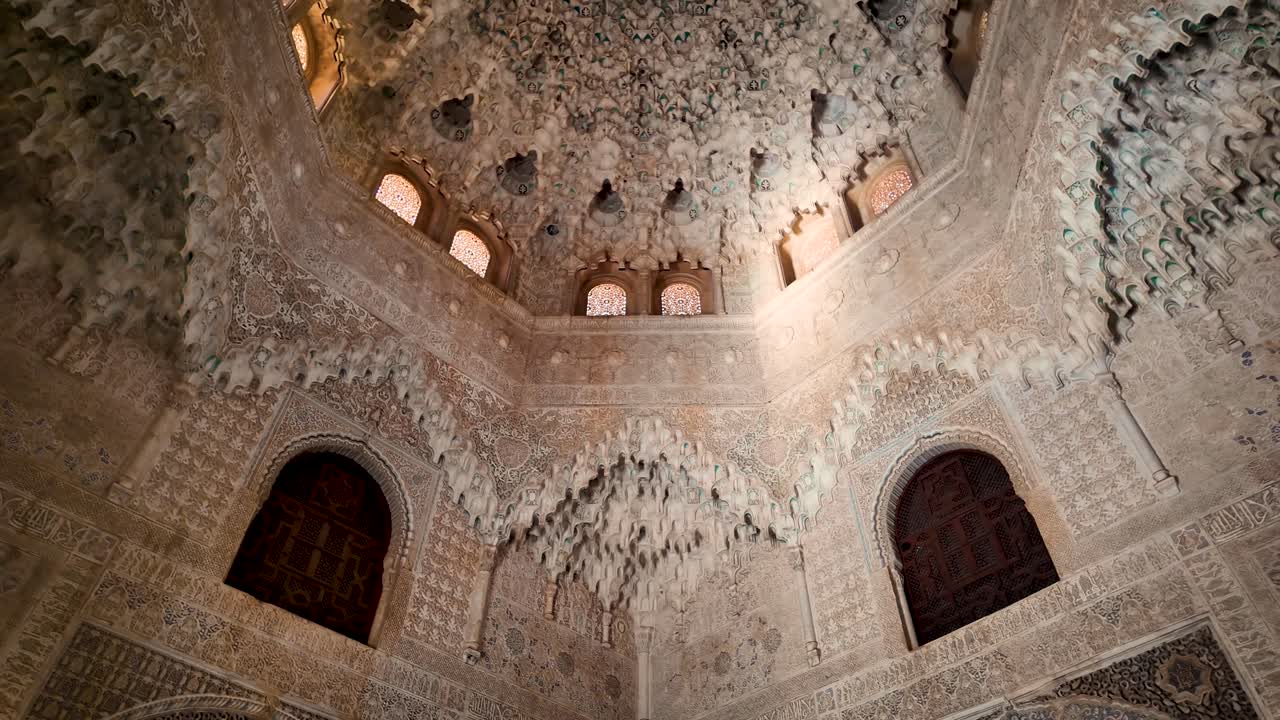 Upward panoramic shot inside a hall of the Nasrid Palaces within the monumental complex of the Alhambra in Granada, Spain