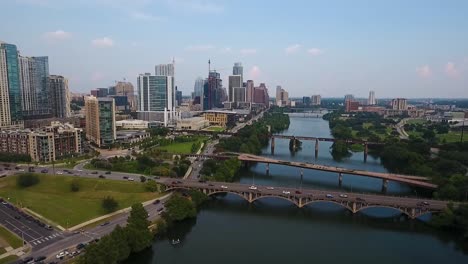 aerial: pulling back from downtown austin, texas on a beautiful sunny day