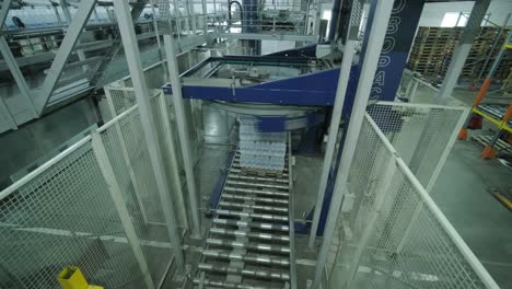 modern strapping and transporting machine for packaging line at beverage plant