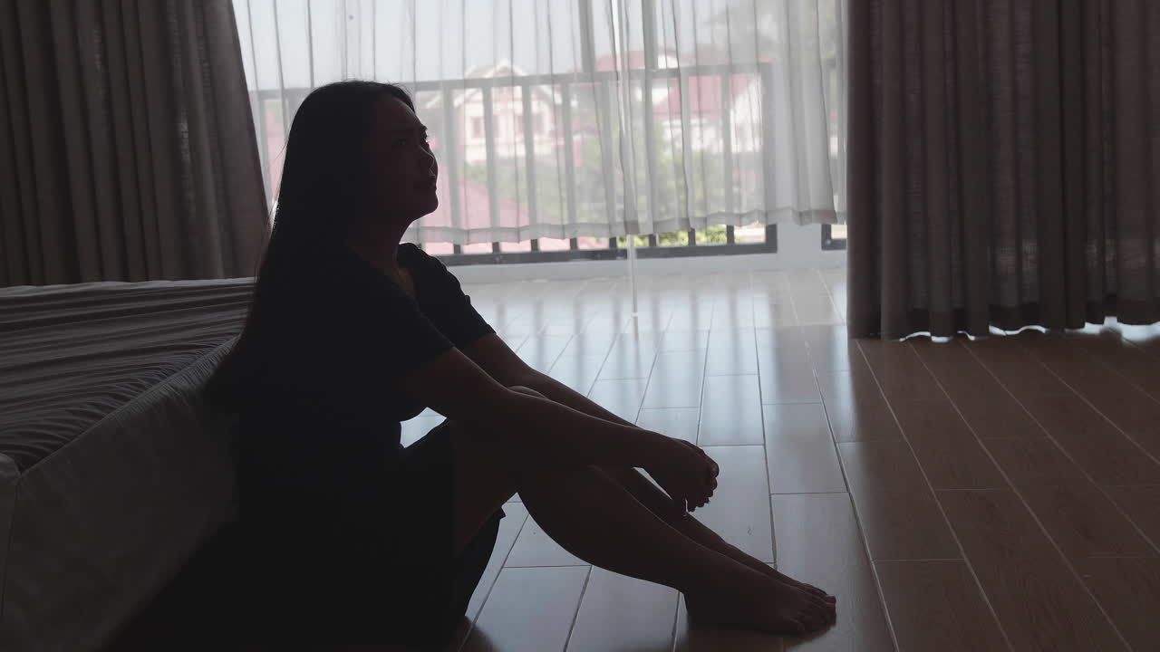 Asian Young Woman Depressed And Stressed Sitting