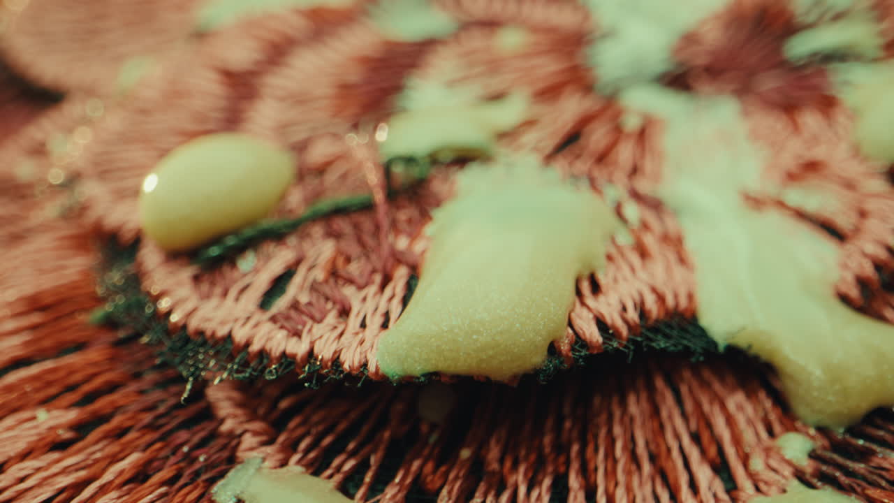Close-up of Embroidered Textile with Resin