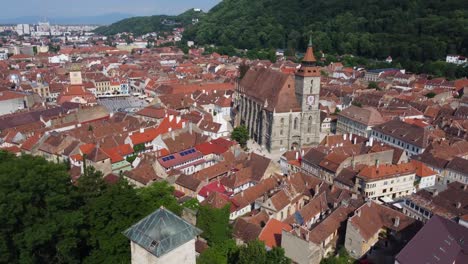 cinematic reveal of scenic brasov old town, black church and town hall - romania