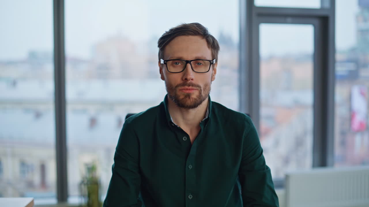 Bearded director posing workplace wearing shirt closeup. Portrait businessman