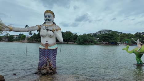 thai tale buddhist statue in water wat phra yai temple koh samui thailand