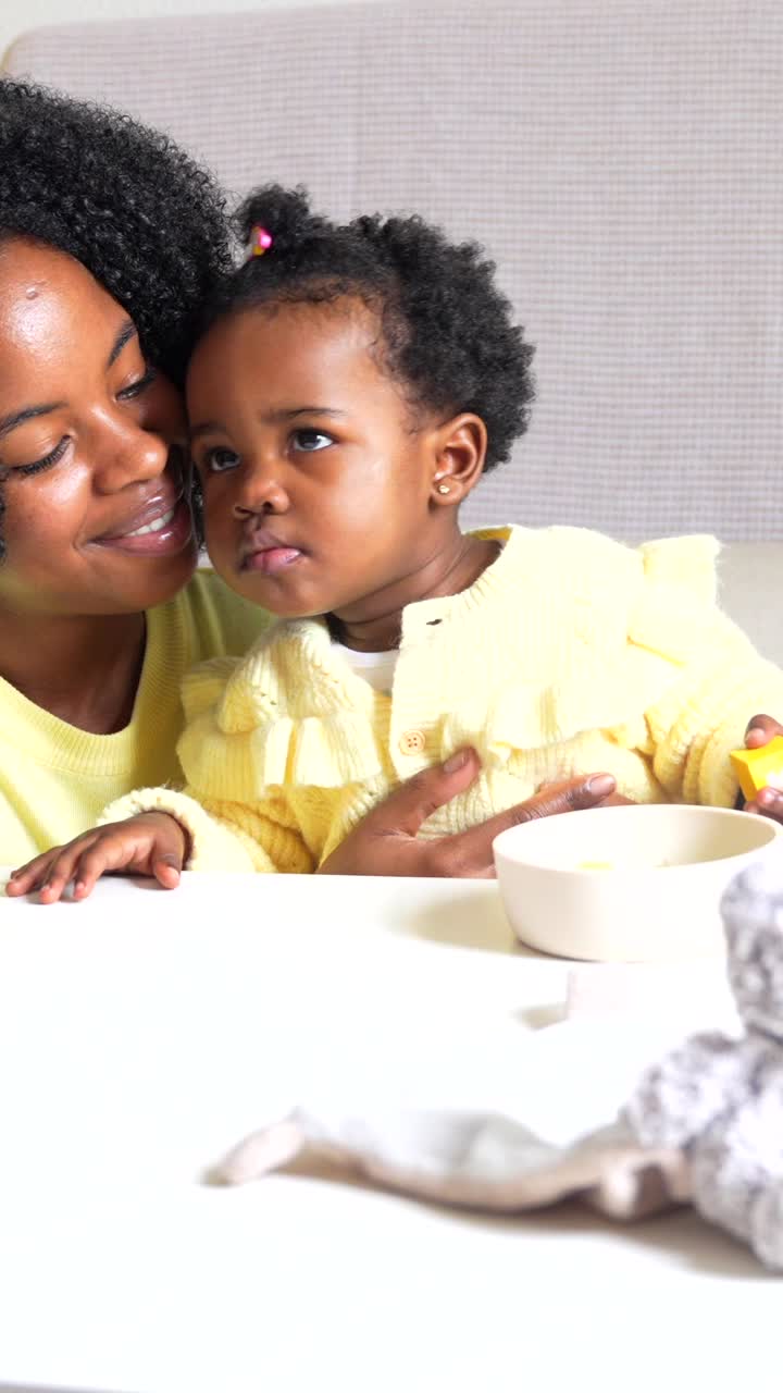 Mother and Baby Eating Together