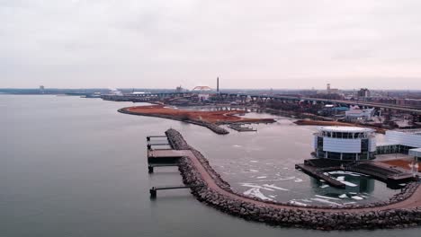 overtake shot of small piers in milwaukee city, wisconsin, michigan lake