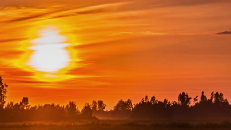 static view of sunset in timelapse over the green grasslands