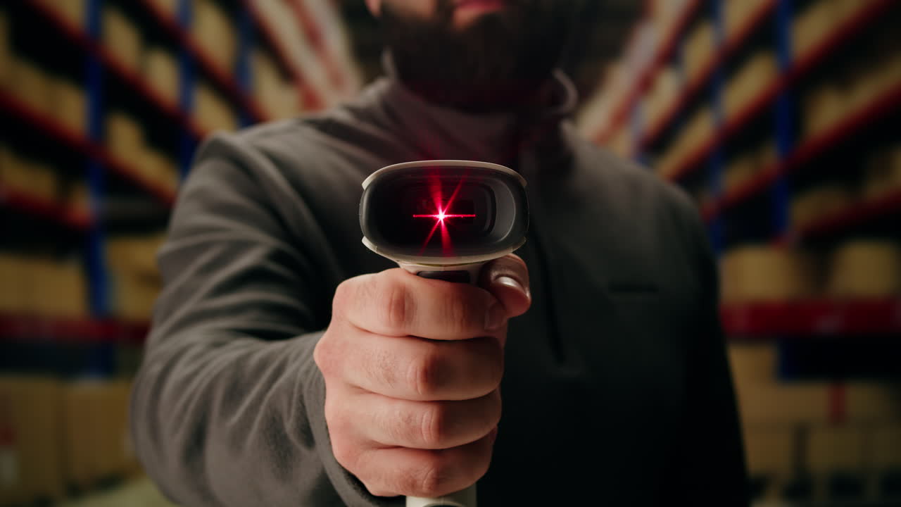 Scanner scan delivery box in storage, E-commerce shop, man packing goods and clothes second hand delivery market, courier Packaging and Shipping Workspace with Supplies and Technology, online sales.