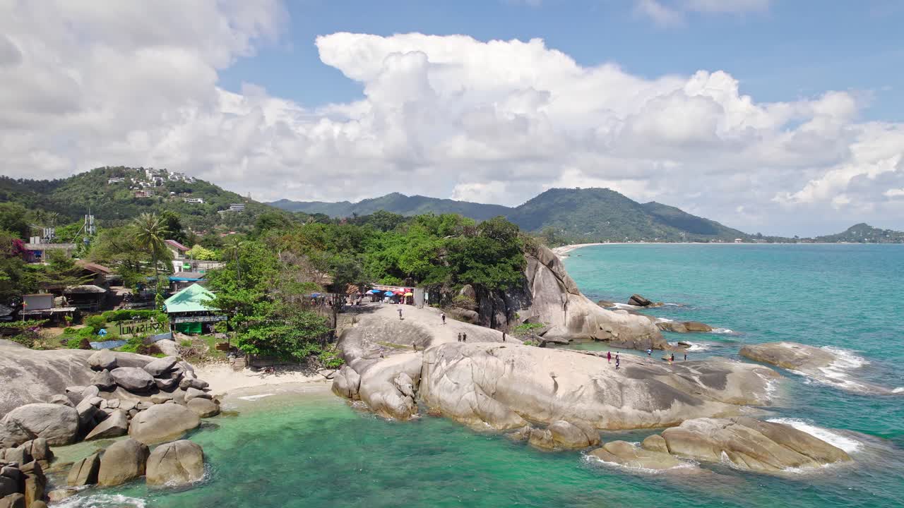 Beautiful 4K drone footage of the beach and unique rock features at Hin Ta Hin Yai Beach on Koh Samui in Thailand
