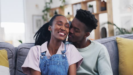 Kiss,-hug-or-happy-black-couple-in-home-living