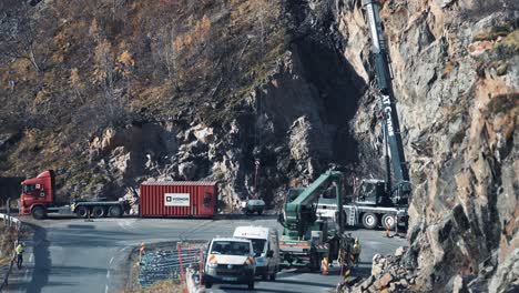 roadworks, hight-works, and slope reinforcement on the narrow mountain road on senja, norway