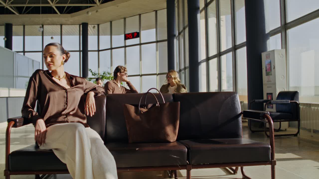 Woman waiting in airport lounge