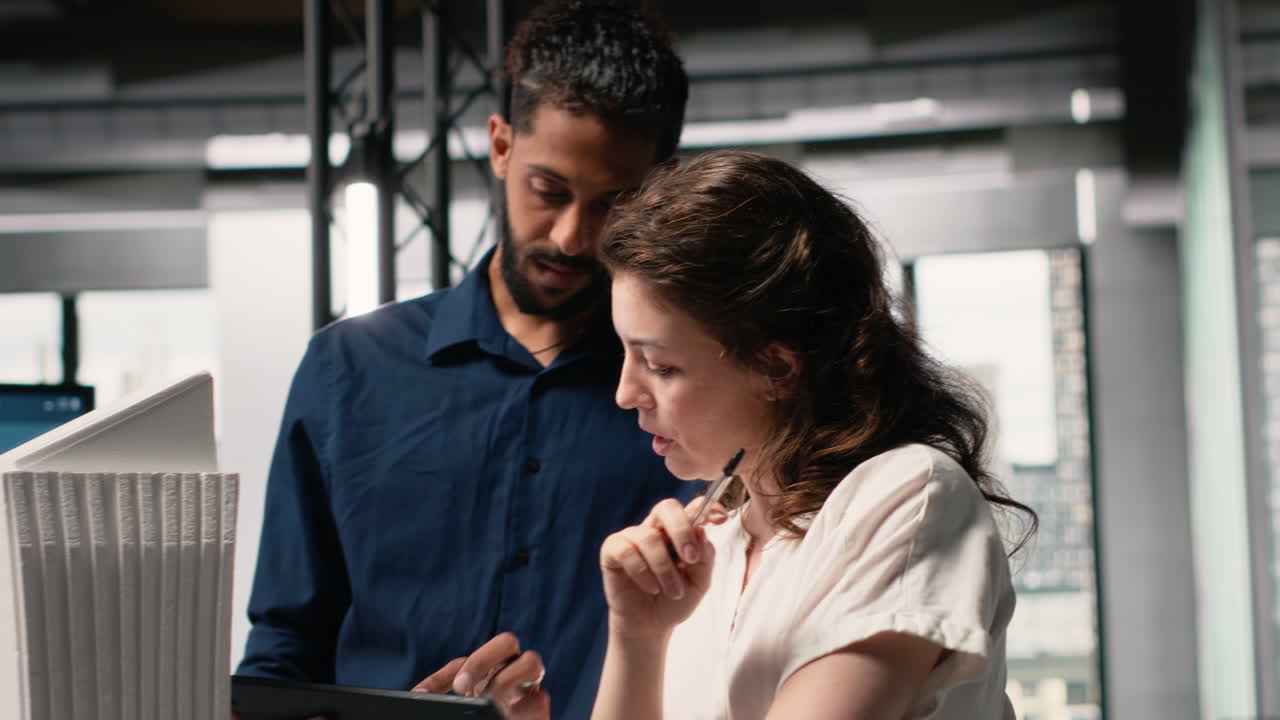 Vertical Video Diverse real estate team creating the layout for a residential area