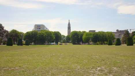 cityscape with big lawn and green grass, low perspective