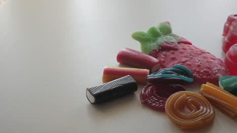 wide and slow panning movement about jellies on a table in studio enviroment at home, spain