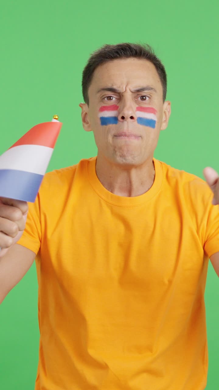 Man Cheering for Holland, angry with the decision of referee