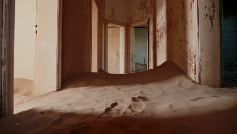 abandoned house filled with sand