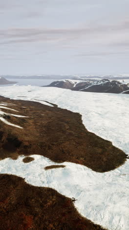 aerial view of a snow covered mountain range