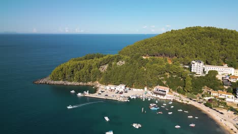 Aerial-Pullback-Reveals-Beautiful-Himare-Coastal-Town-on-Albanian-Riviera