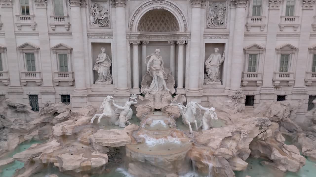 The Trevi Fountain, One Of The Most Famous Monuments In Rome, Italy. Descending Aerial Shot.