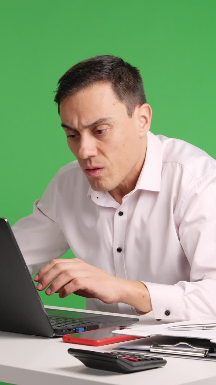 Worker gets angry because the computer has crashed