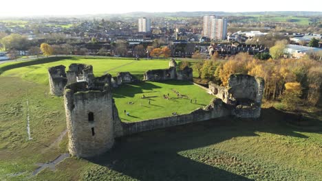 ancient flint castle medieval heritage military welsh ruins aerial view landmark over fly shot