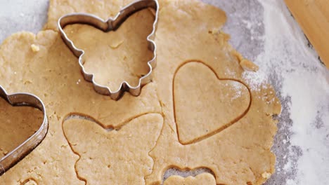 gingerbread dough with flour and cookie cutter 4k