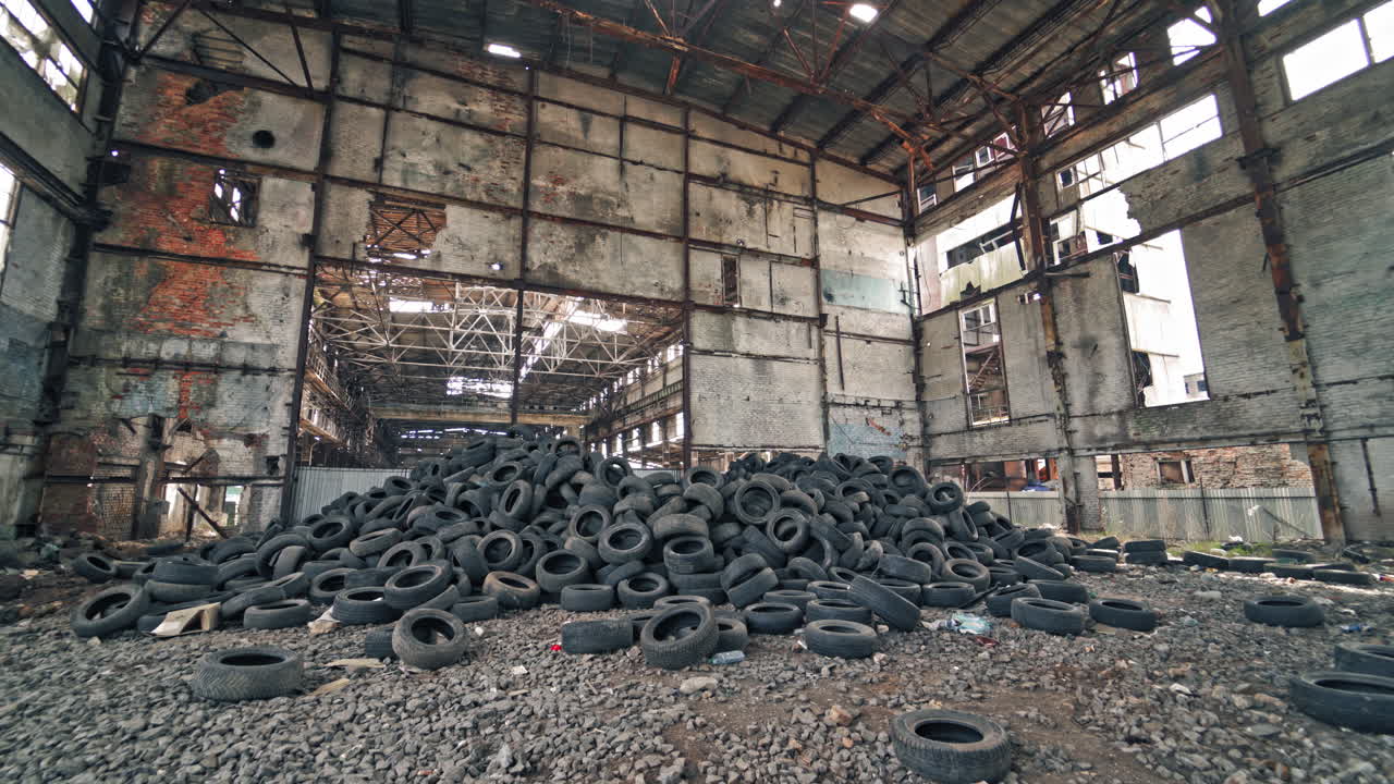 Wheel of cars in recycling. Old rubber wheels for trash factory recycling