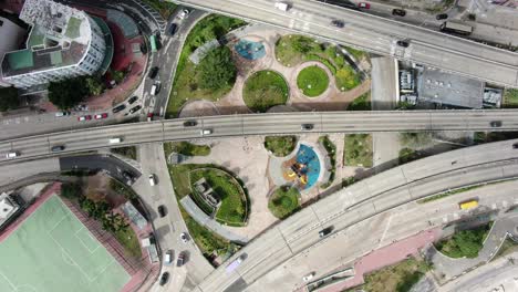 traffic on a highway interchange in downtown hong kong, aerial view