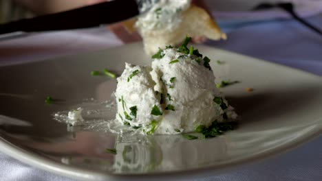 cream cheese is applied to the bread