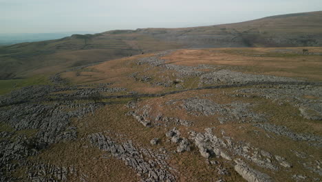 flying over rocky moorland of yorkshire moors uk