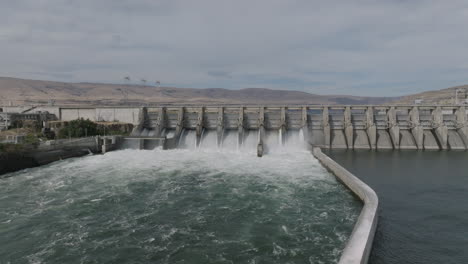 drone aerial of a hydroelectric dam along the