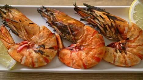 grilled tiger prawns or shrimps with lemon