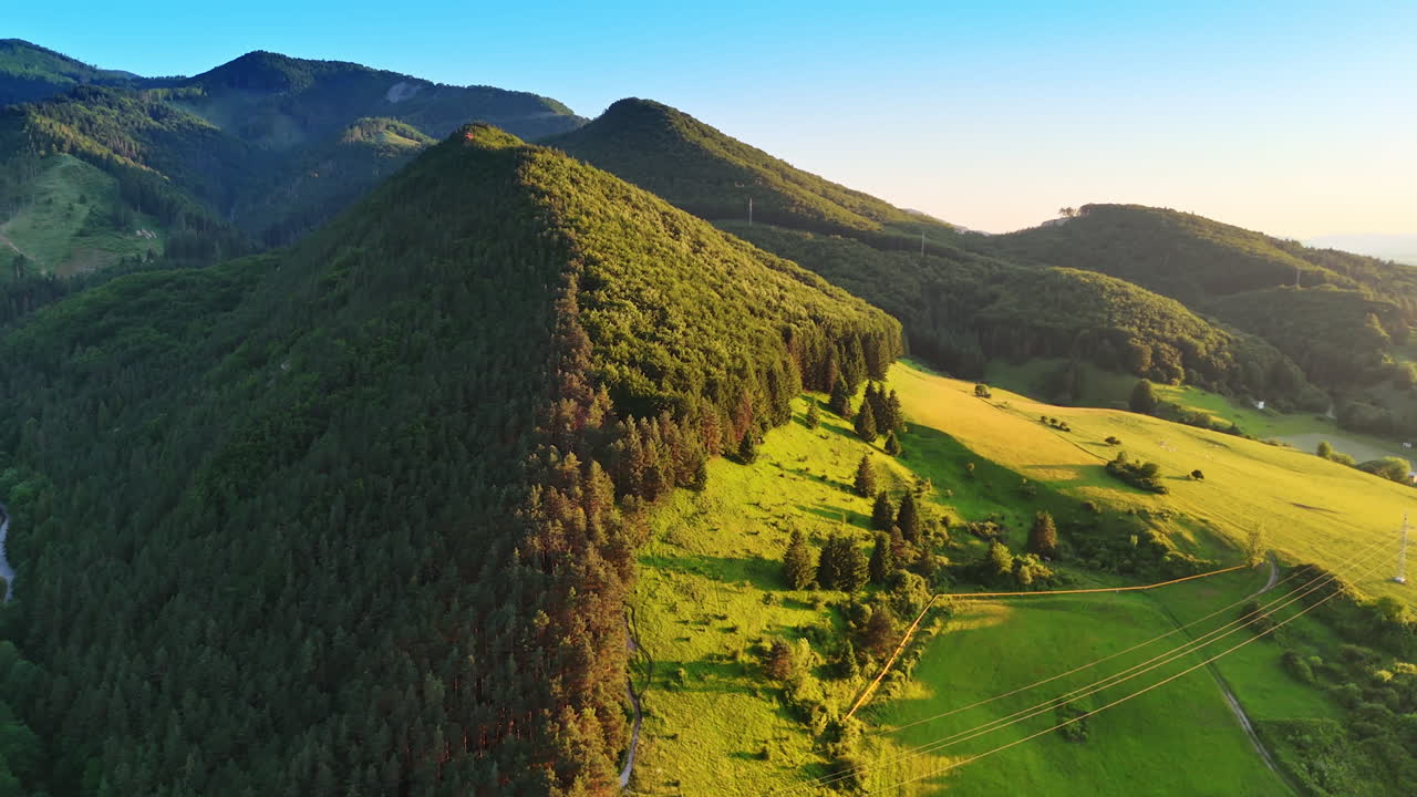 Evergreen pine tree woods cover the stunning Tatra mountains. Aerial perspective on wonderful nature of Slovakia