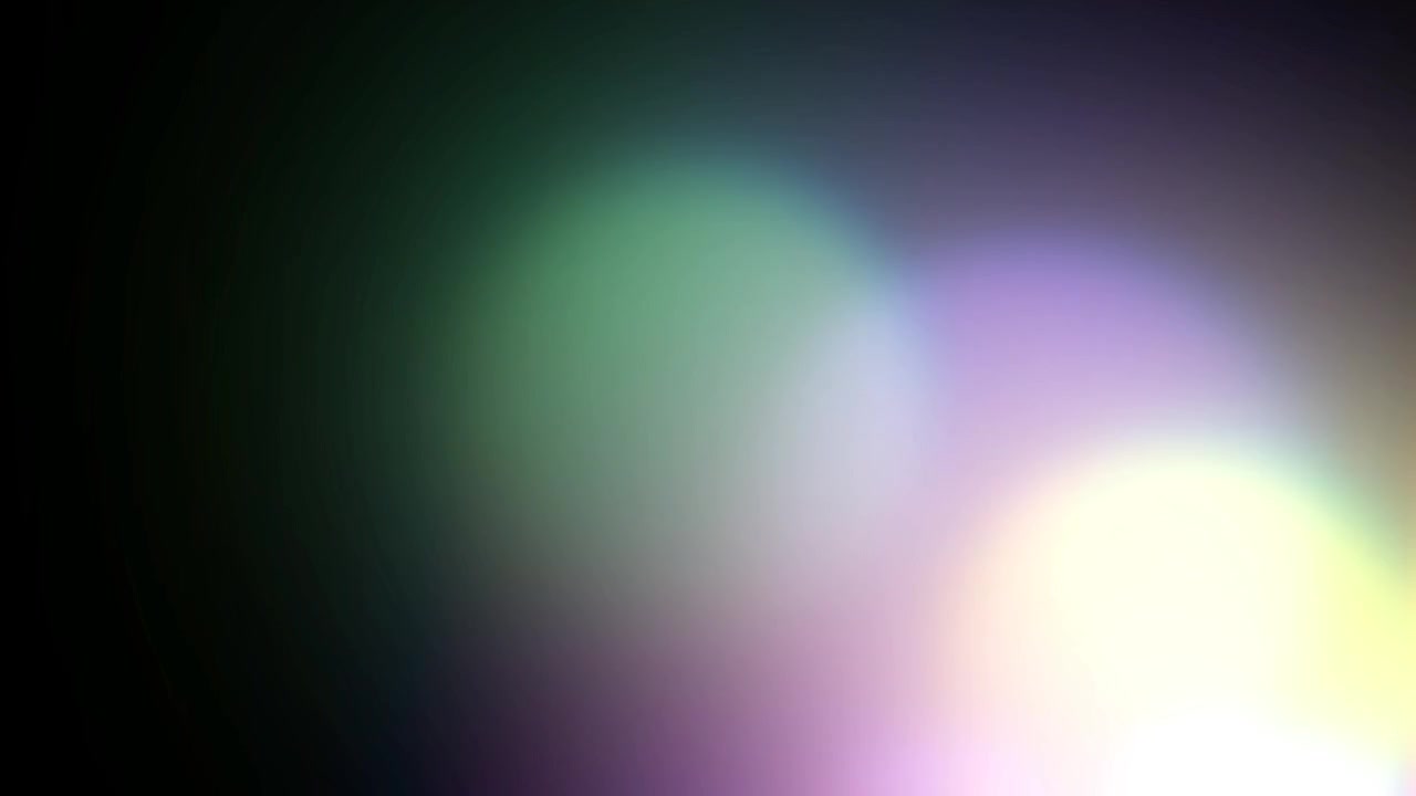 Abstract Light Leaks and Bokeh Effects on Black Background