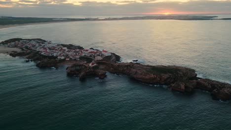 drone shot over baleal island in oeste region at sunset, portugal