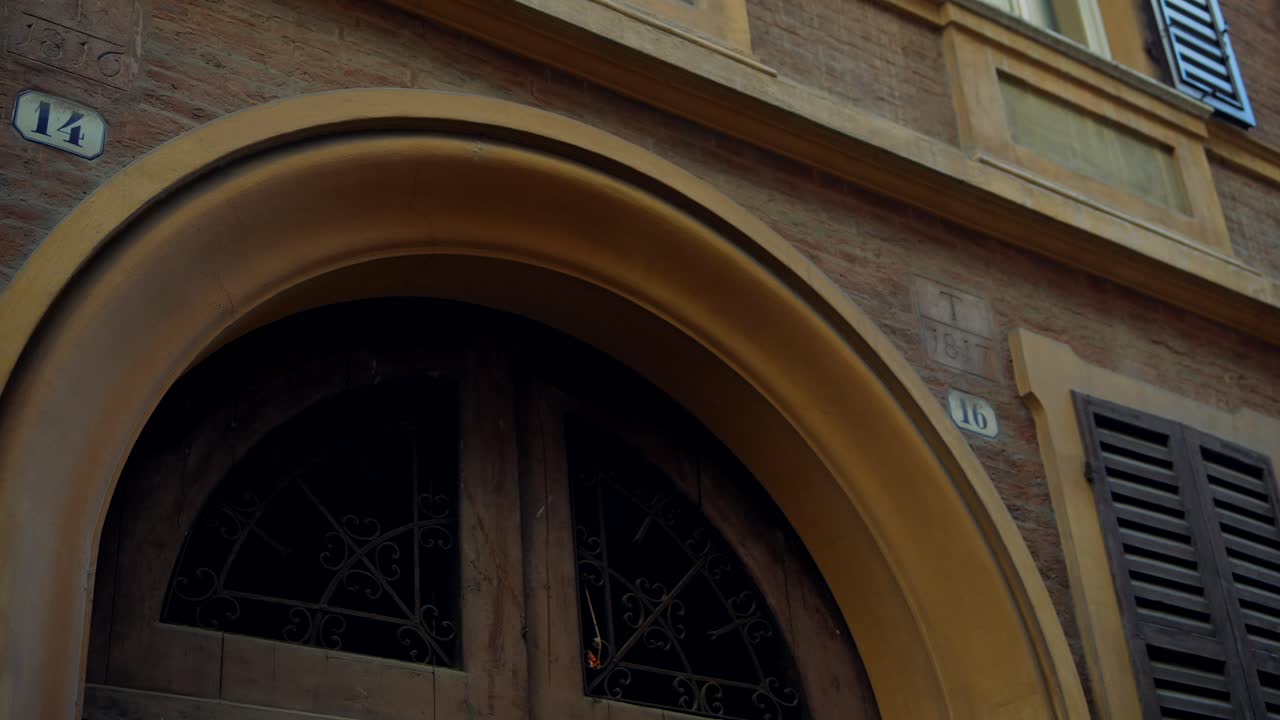 Exterior of an Old Italian Building with Wooden Shutters