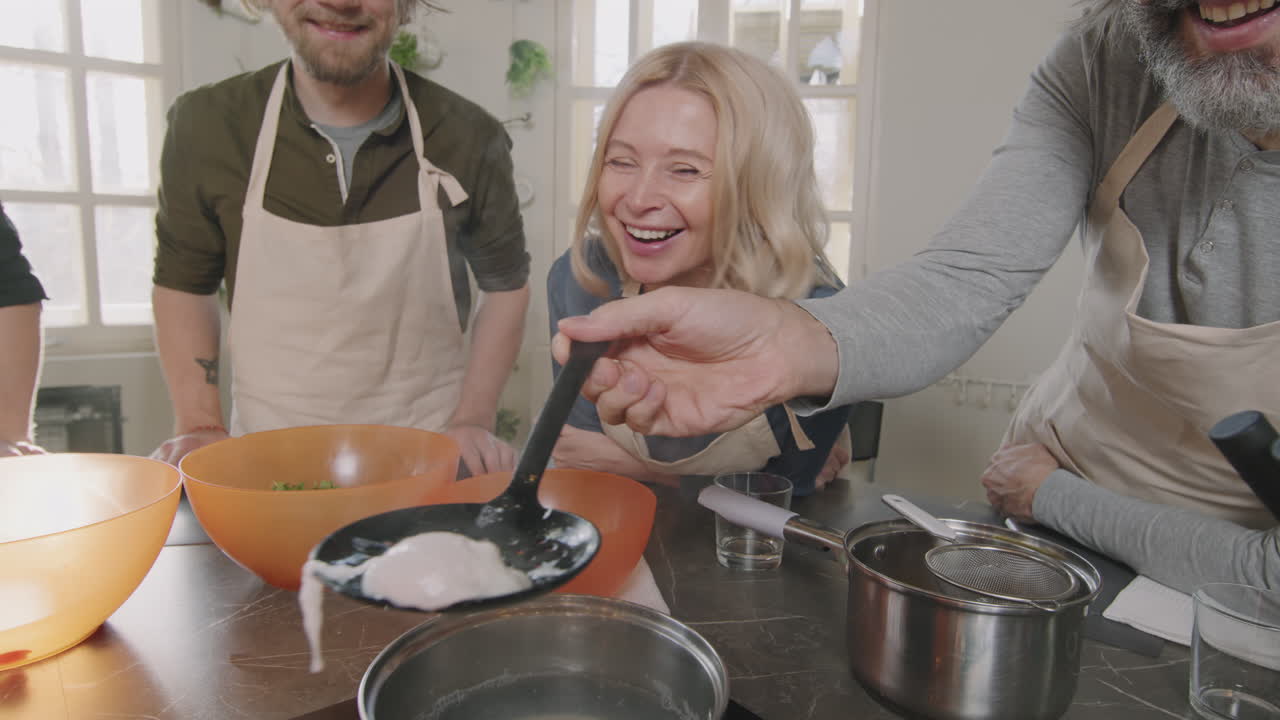 Joyful People Cooking Poached Egg