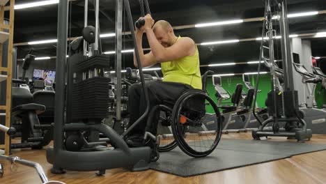 man with disabilities training in the gym of rehabilitation center