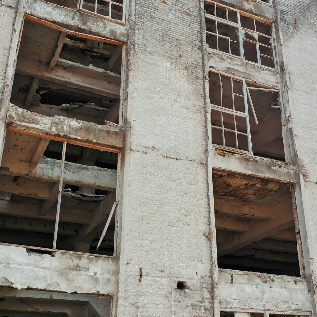 Aerial view of an abandoned industrial plant. Factory ruins.
