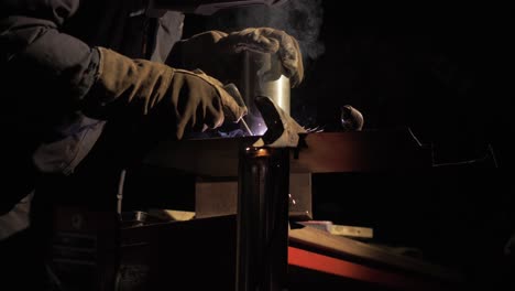 shielded metal arc welding stainless steel pipe in workshop