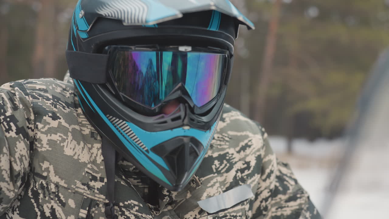 Motivated rider preps. Excited rider prepares mentally and physically for rugged terrain challenge. Focused motorcyclist gets ready to navigate difficult forest paths confidently and safely